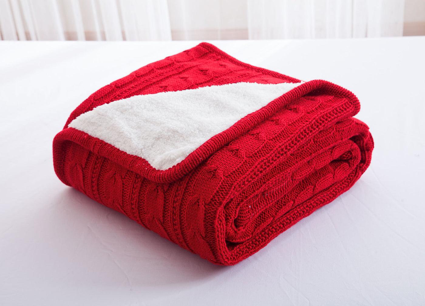 Knitted wool blanket with fleece